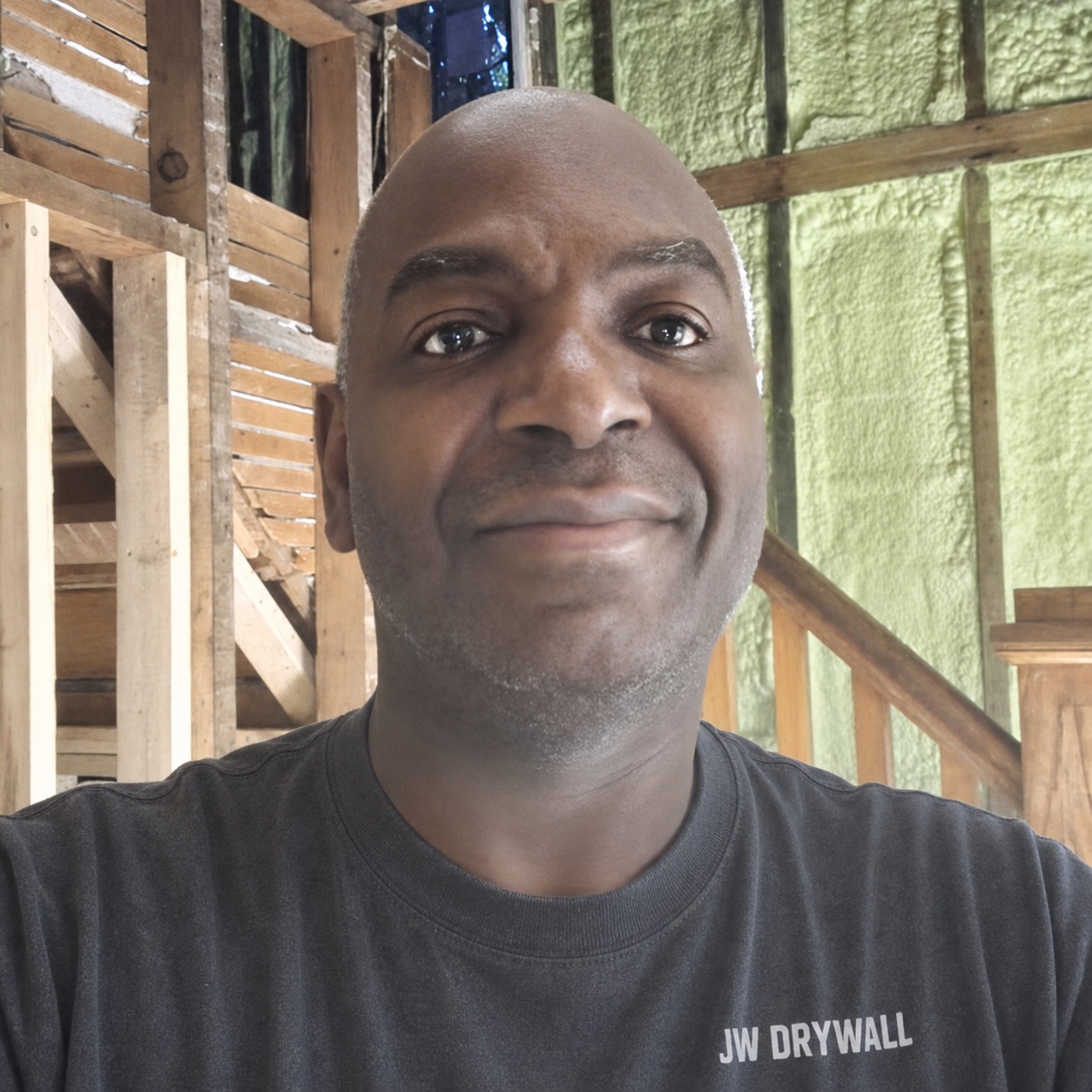 Joel, owner of JW Drywall & Framing, on a job site